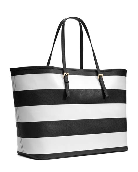 michael kors jet set travel stripe tote|Michael Kors airplane print.